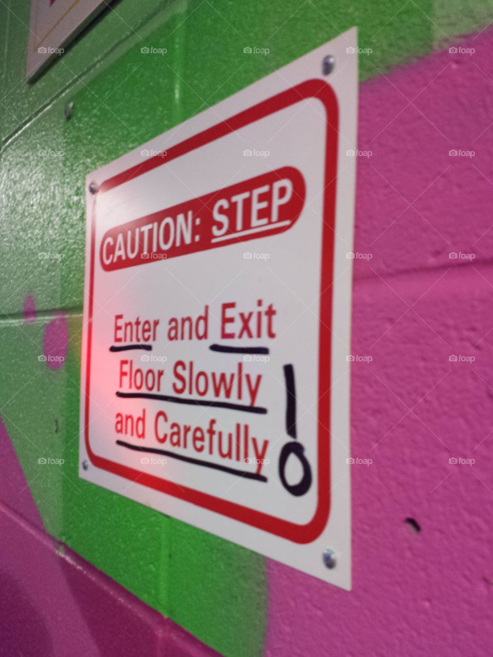 Caution board on wall