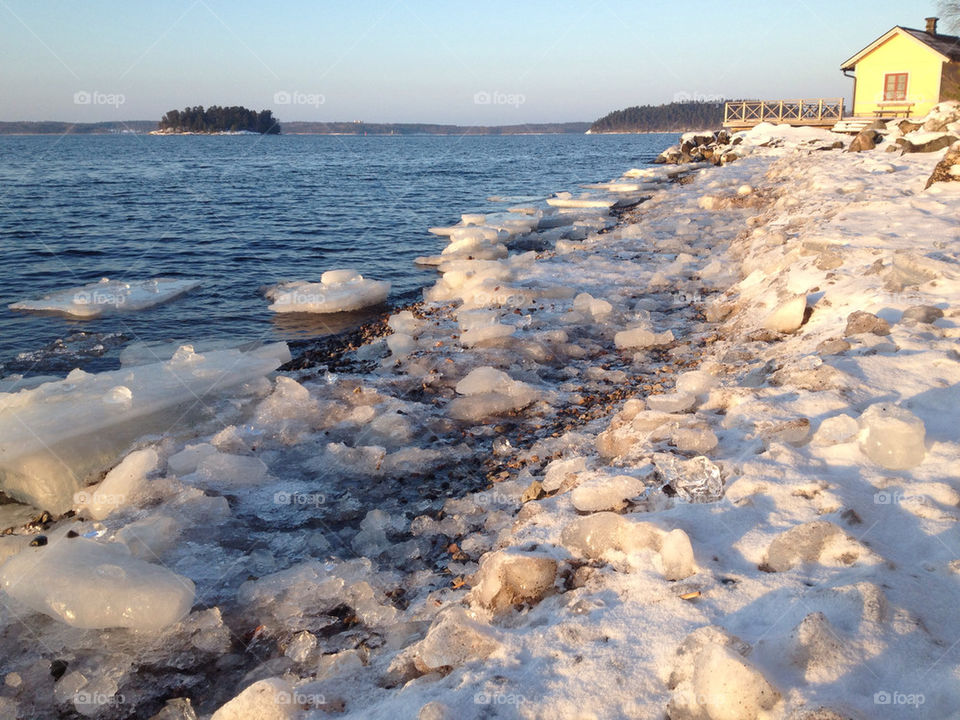 Icy seaside at the end of winter