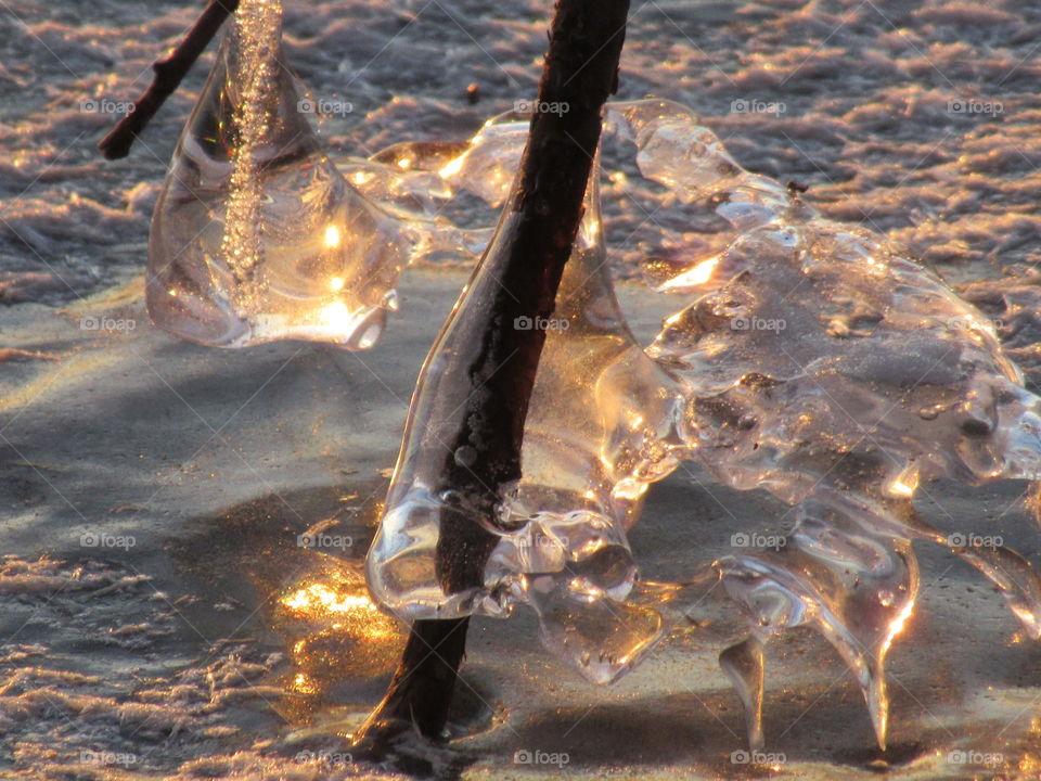 frozen water in the sun, ice and fire