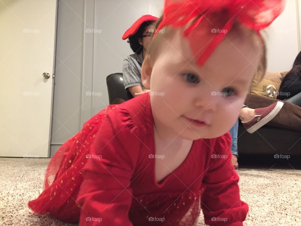 Baby girl in red bow 2