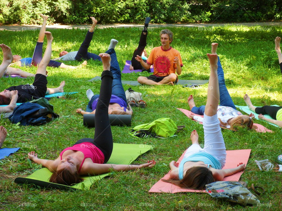 group of people doing yoga outdoors, Ukraine, Kiev