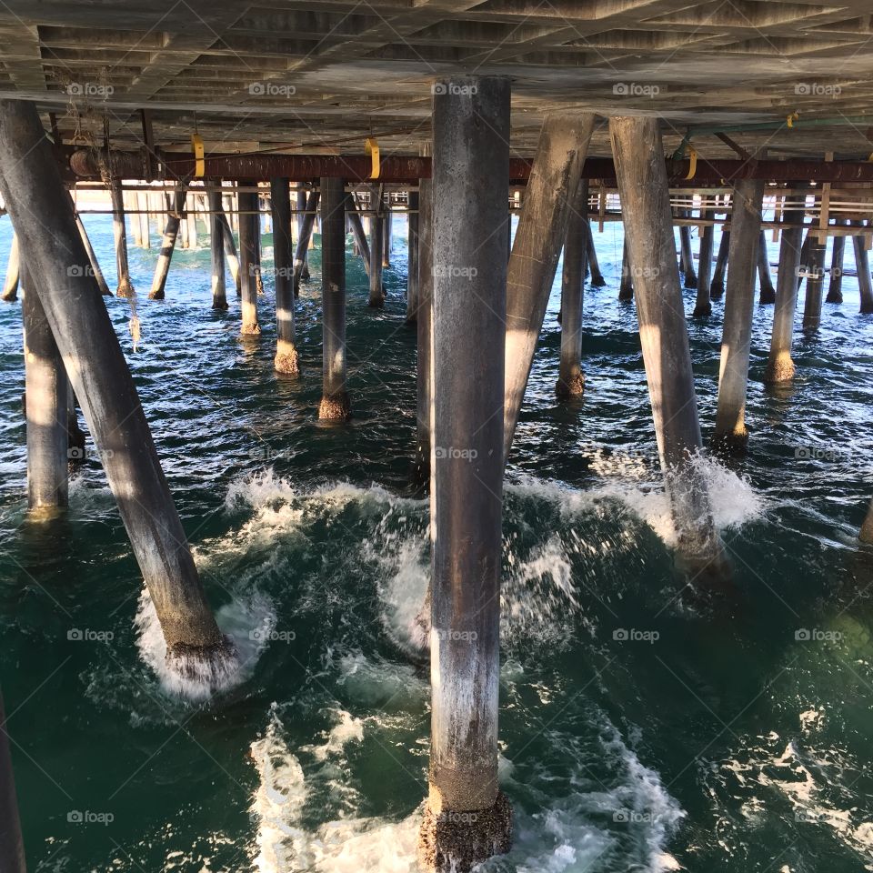 The underside of the Santa Monica Pier. California. 
