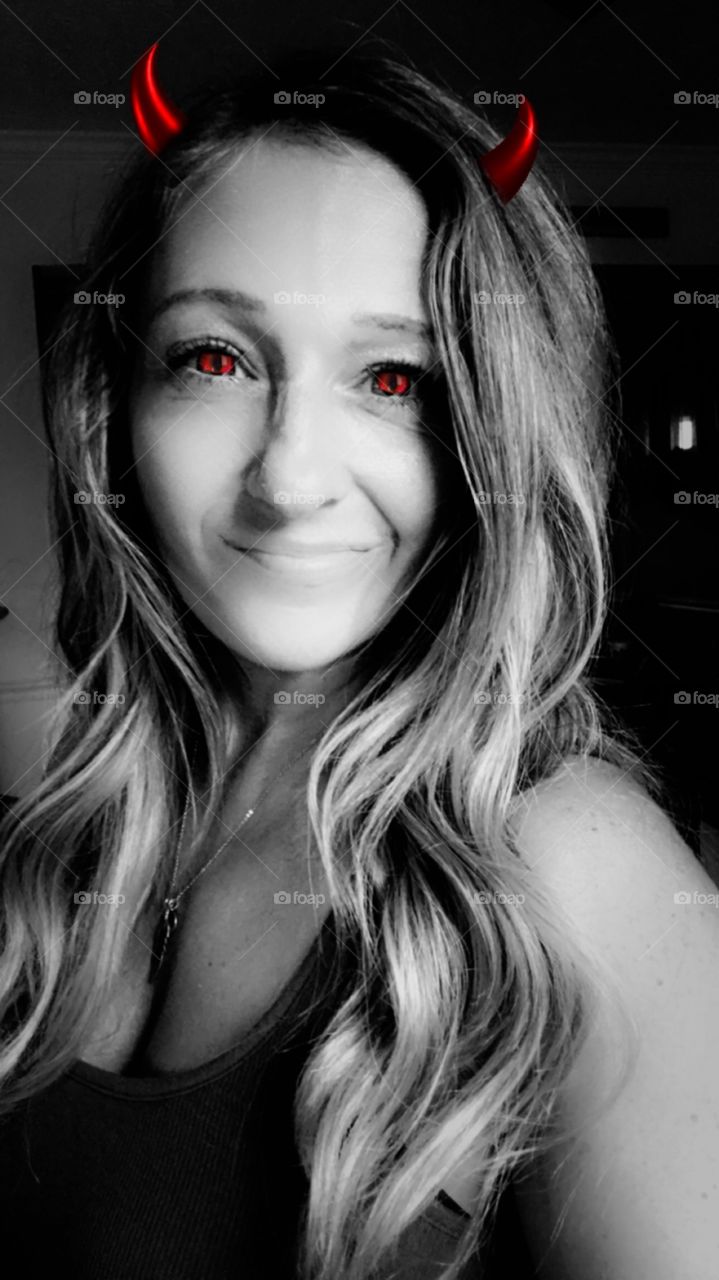 Playing around with filters, and decided to dance with the devil a little. Red eyes, red horns, devilish grin. 