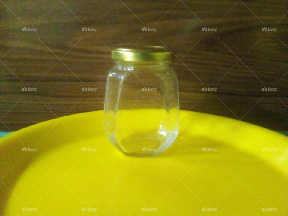 empty bottle on the plate