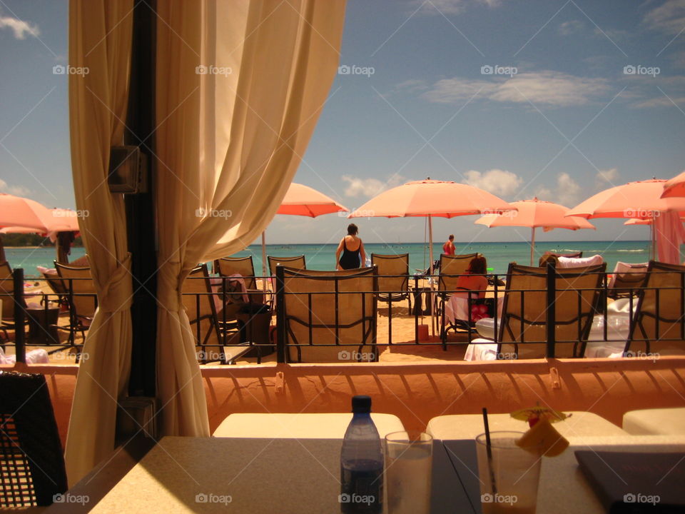 Beach Umbrellas. Patio on the Waikiki Beach