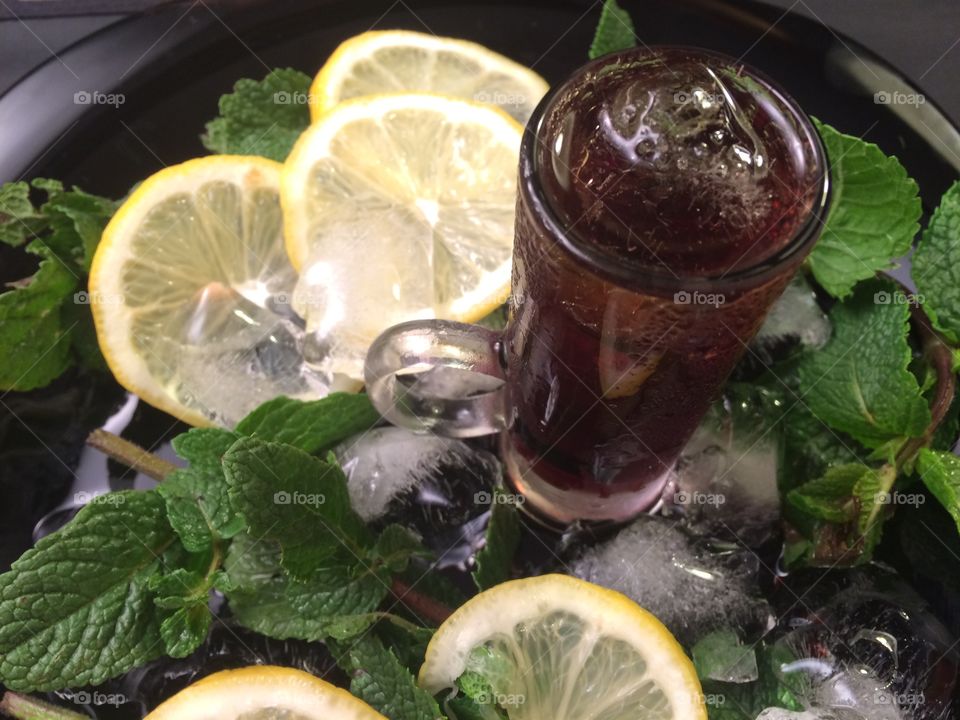 Drink. Lemon. Mint. Glass. Ice. 