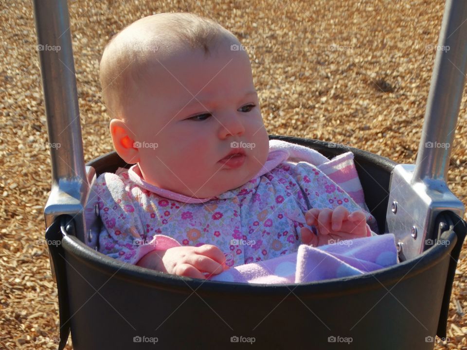 Baby Girl In A Swing