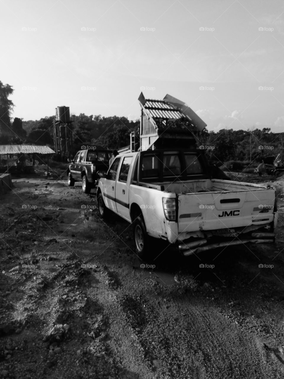 cars parked for washing at mining site
