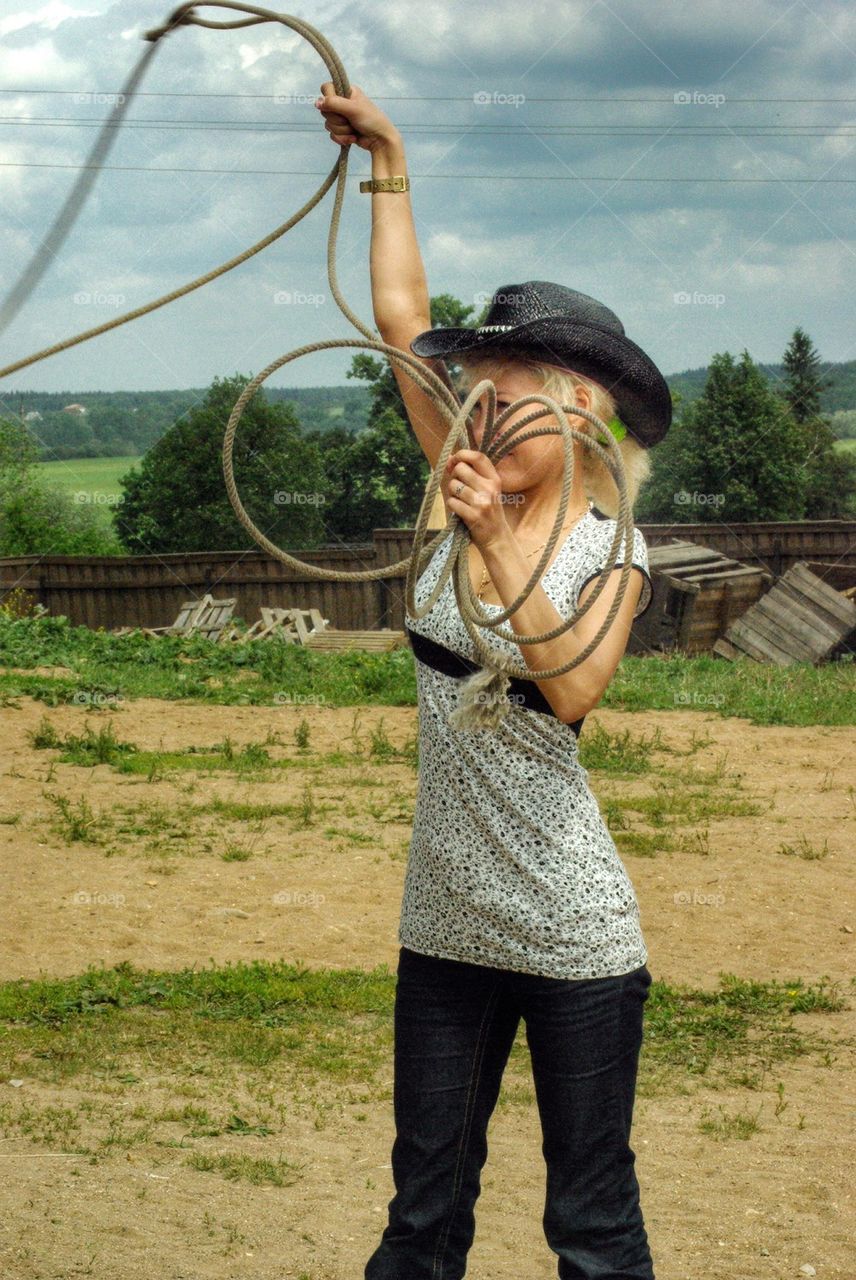 Cowgirl with a rope. 