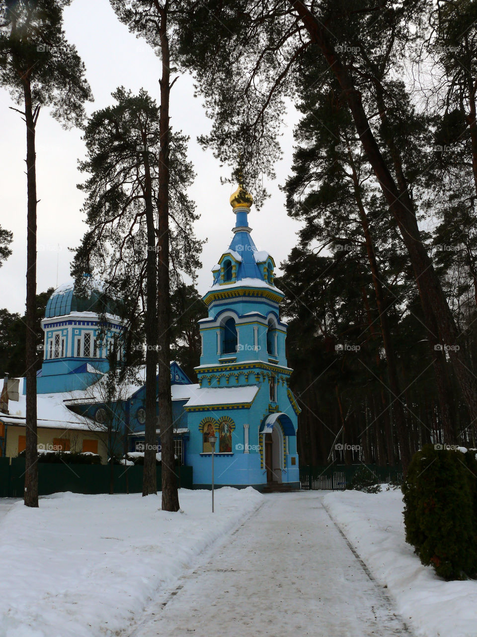 Church amidst trees during winter in Jūrmala, Latvia.