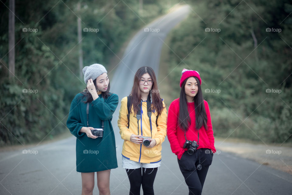 Cute tourist girl on the road 