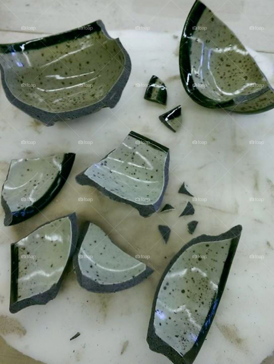 Broken. Broken handmade ceramic bowls.
