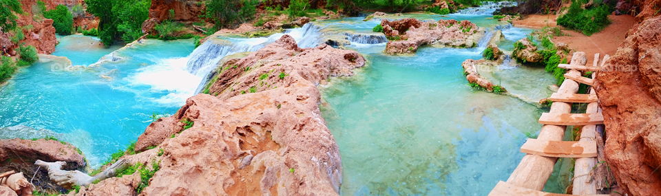Havasu Creek is a brilliant blue creek running through the  bottom of the Grand Canyon