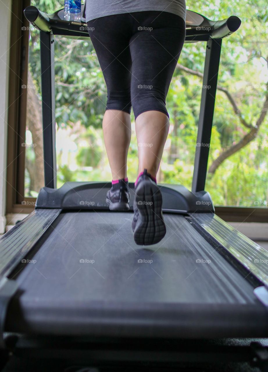 Exercising on a treadmill 