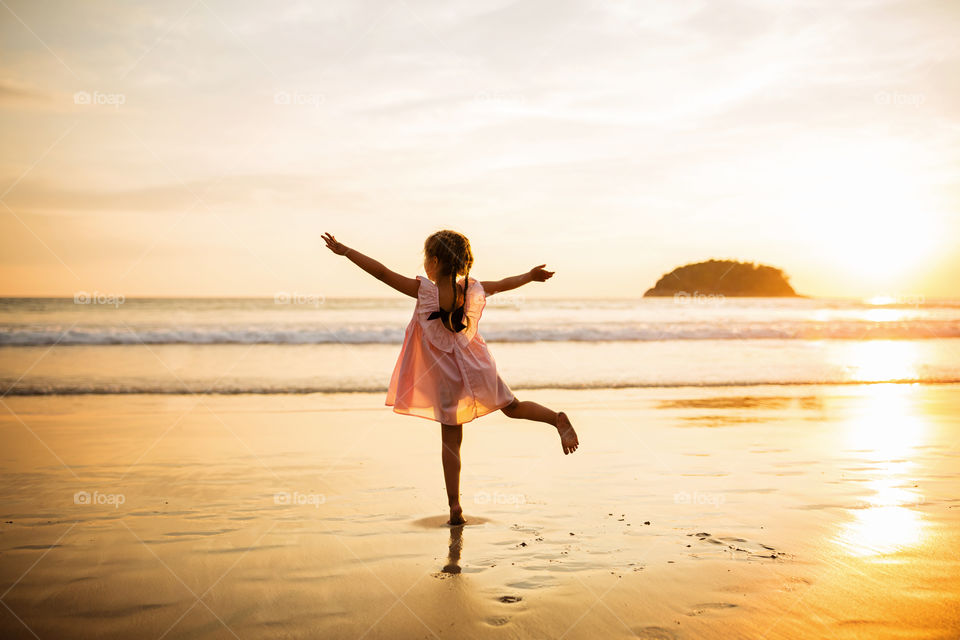 Little girl on the beach 