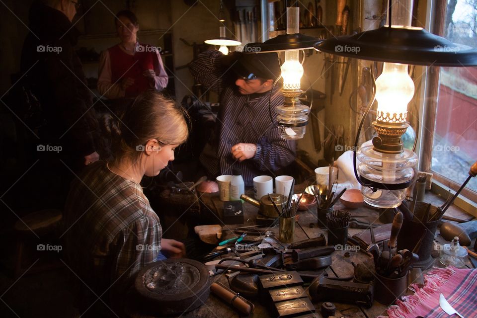 Group of people working in workshop