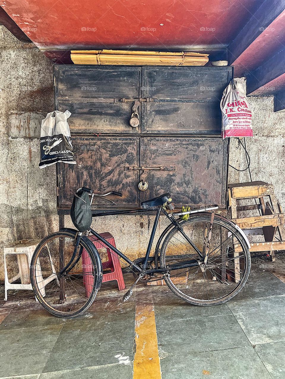 Bike at stand in India, roadside stand in India, bikes in different places, riding bikes in India, bikes as a form of transportation 