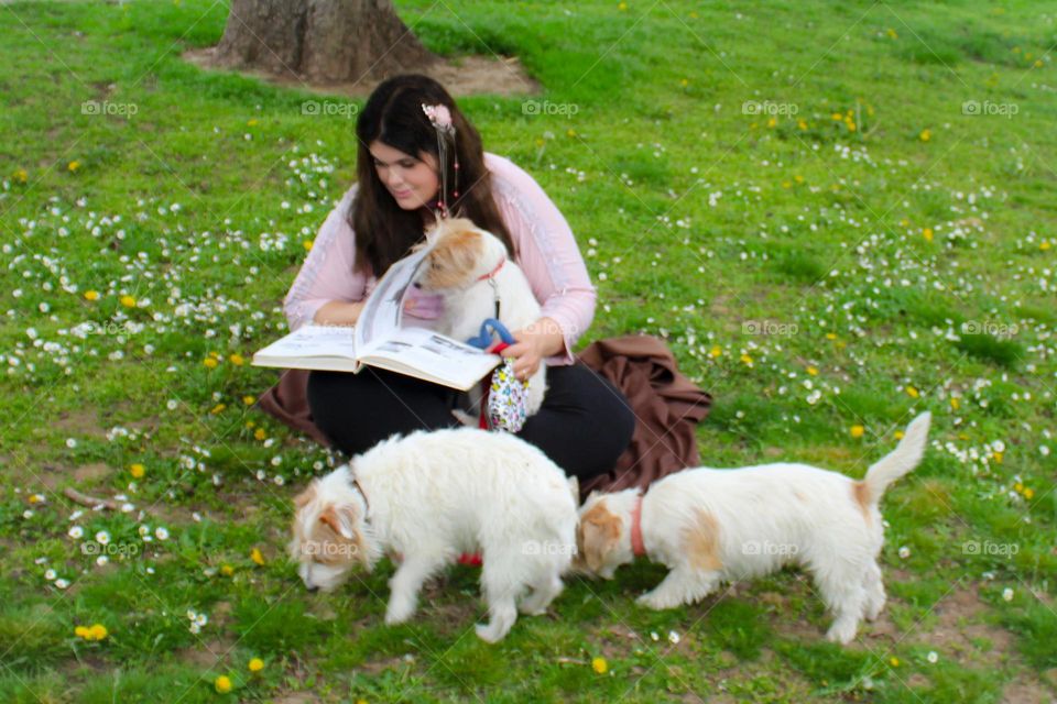 Reading a book on the grass