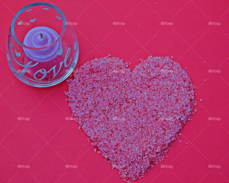 The best known, universal symbol of love is the heart-shaped ideograph, and it symbolizes the core of romantic love, affectionate emotion and caring.