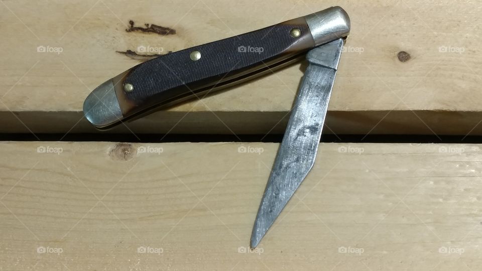 Pocket Knife Art On Wood