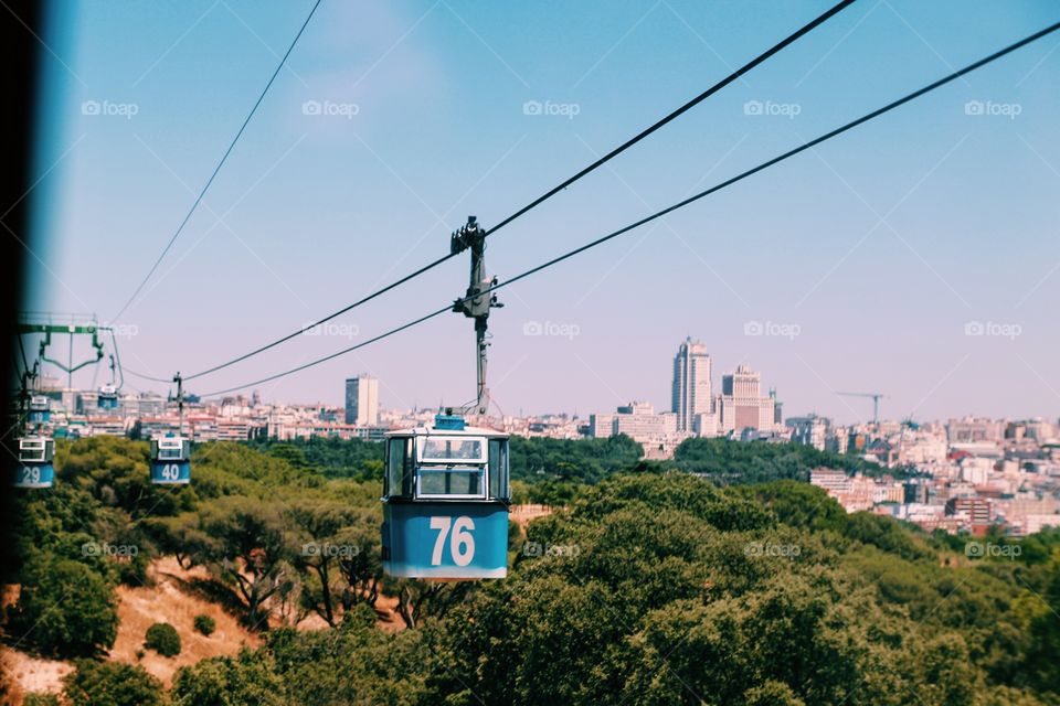 Madrid city skyline and a cable car