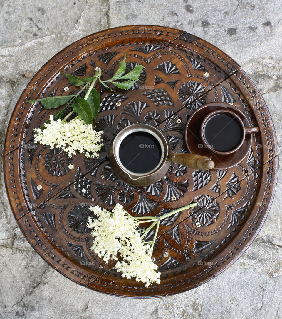 Wood carved round table for coffee