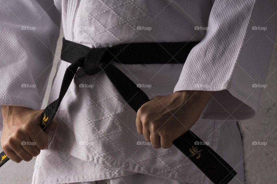 kimono with black belt , close up