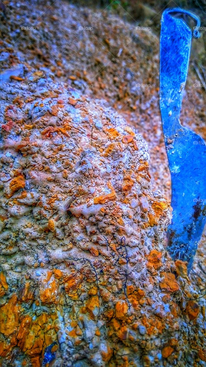 knife stuck in the mountain rocks