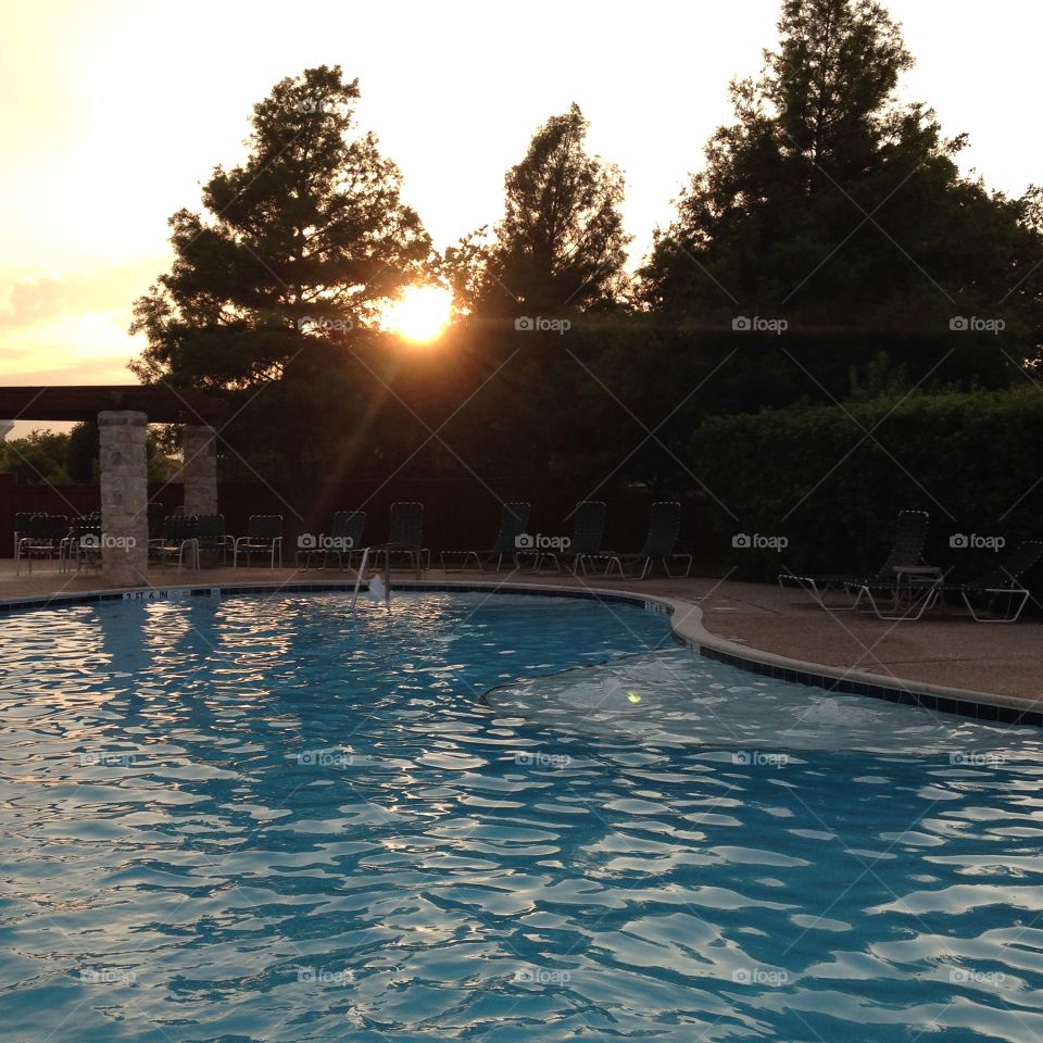 Sunset pool. Pool at sunset