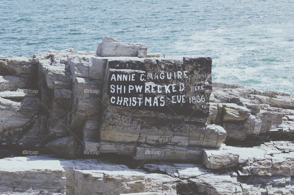 Words on a rock at the Portland Lighthouse