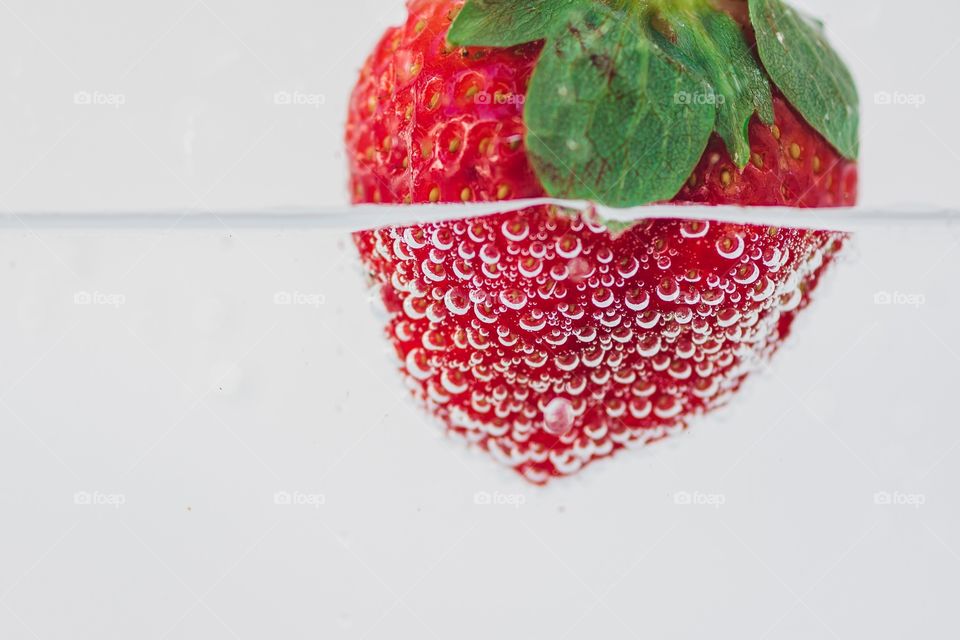 Fresh strawberry in the water 