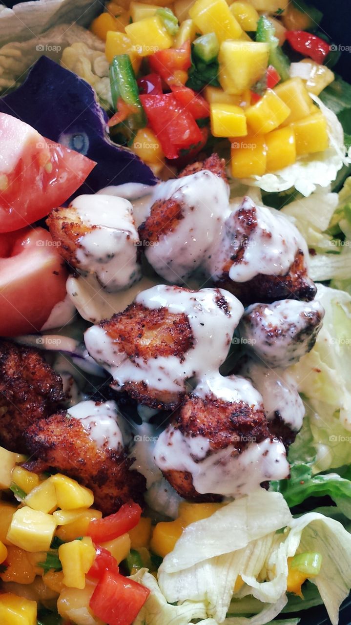 Multi colored salad on table