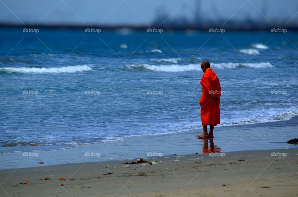 Monk on the beach
