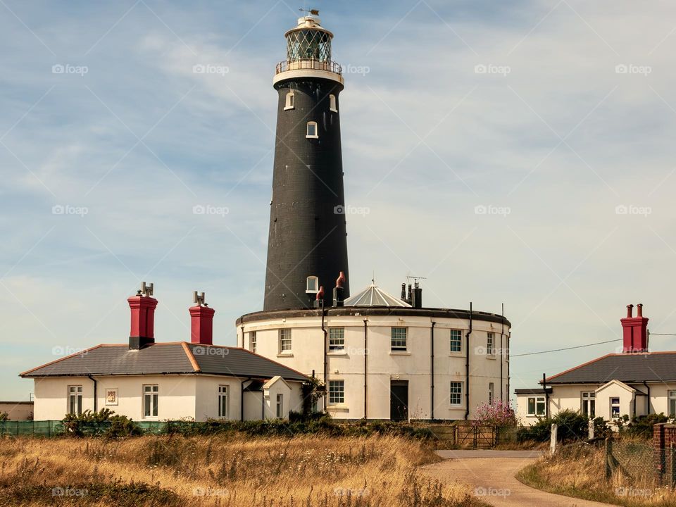 The fourth old lighthouse (1904) and keeper’s quarters (1843) at Dungeness, Kent, U.K.