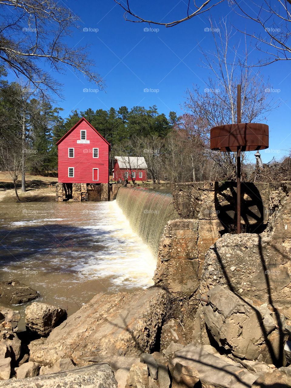 Red mill and waterfall