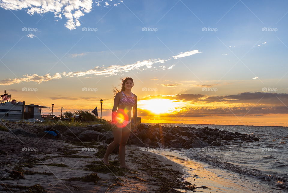 Beautiful girl with a sunset