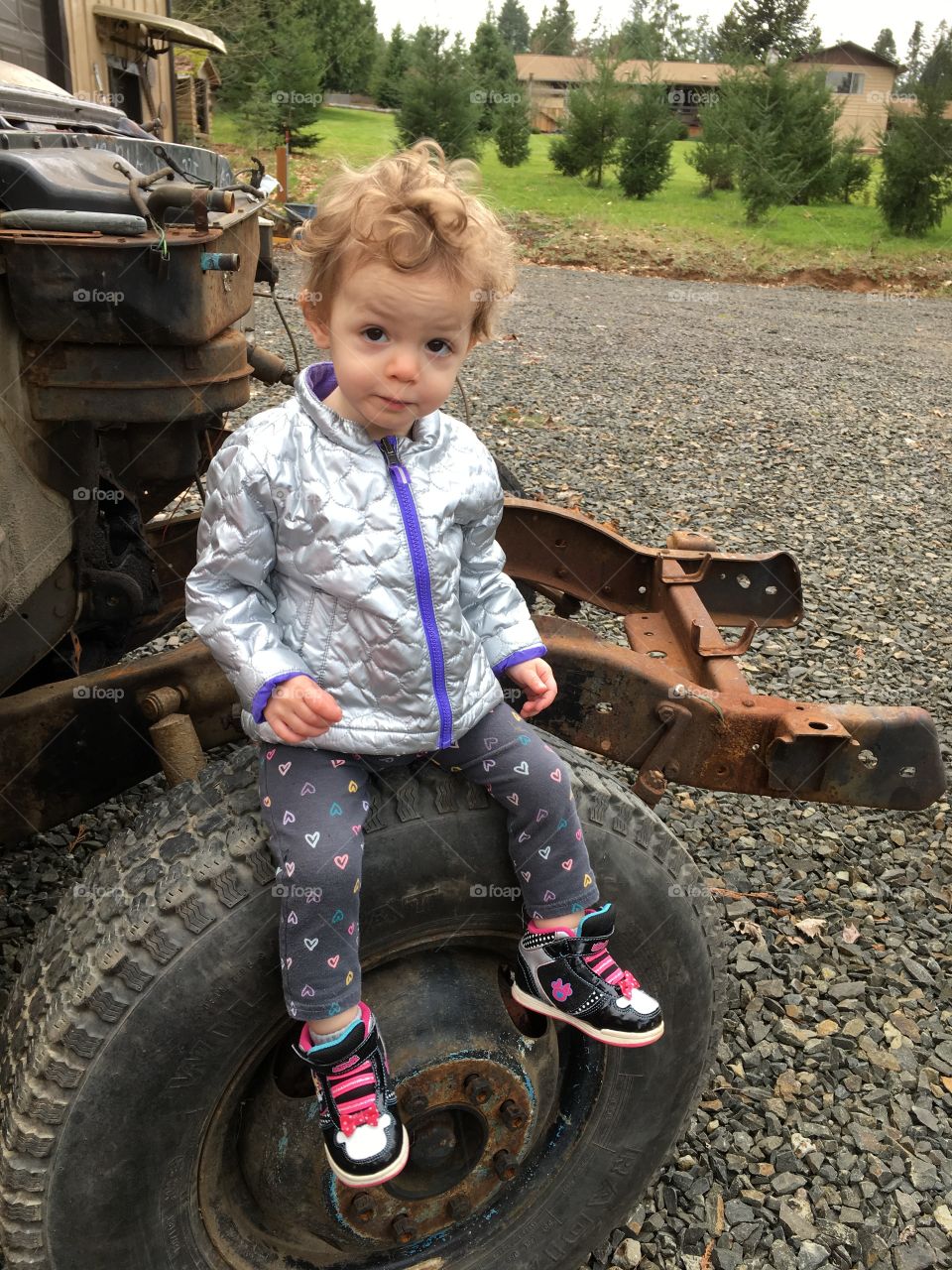 Sitting on the tire of grandpa’s project truck 