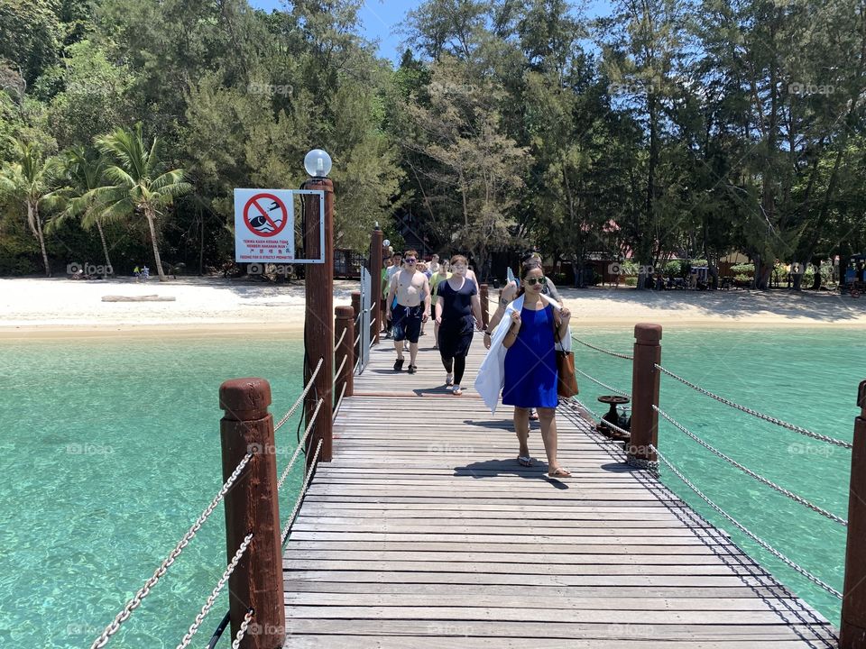 Tourist in the Jetty Manukan Island the most of popular destination for vacation around Kota Kinabalu City,Sabah,Malaysia