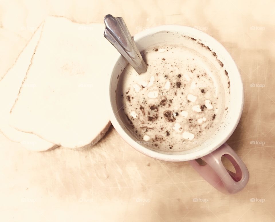 Hot chocolate with marshmallows and toasted bread in the morning 