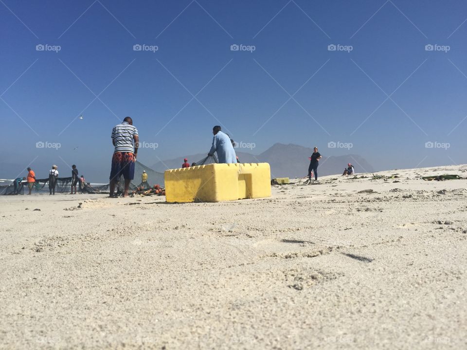 Fishermen on beach
