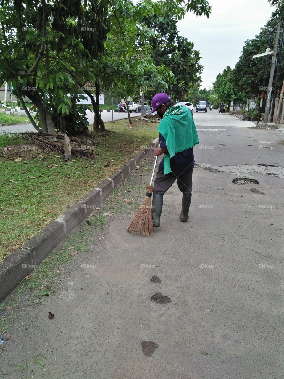 Potrait of sweeping man