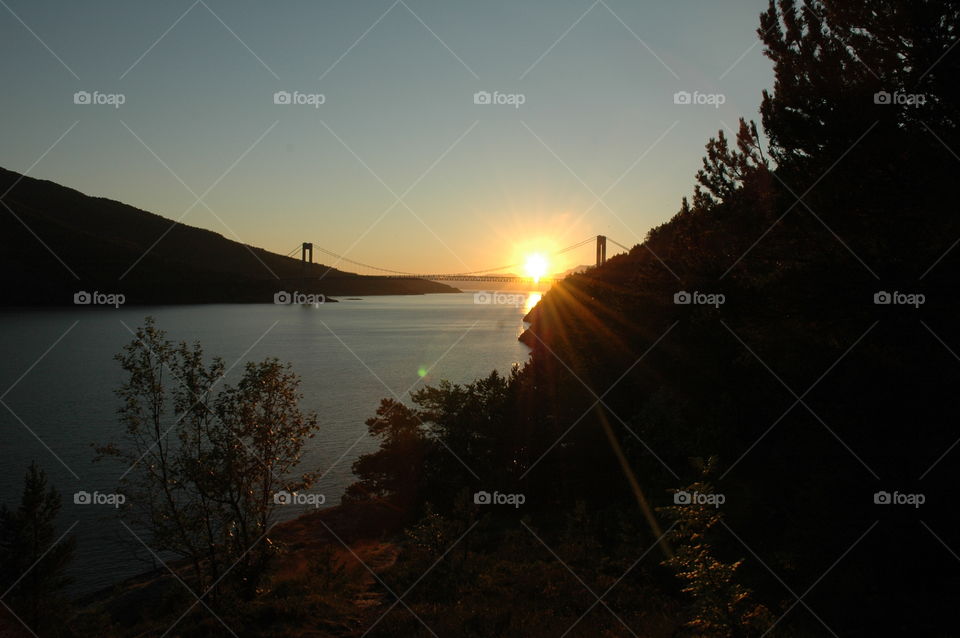 sunset river bridge