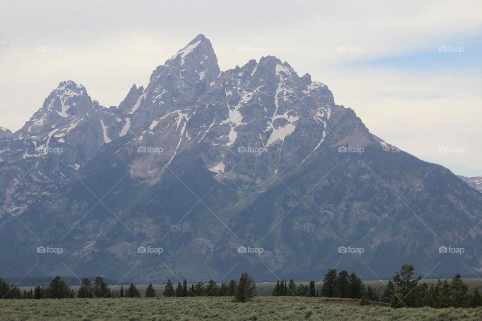 Tetons mountain mountains views scenic view Field Prairie beautiful snowy cloudy cloud mountainside