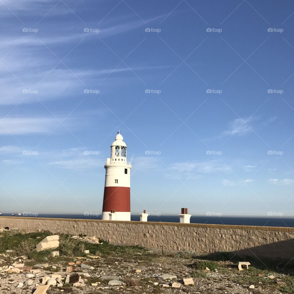 Lighthouse-ground-grass-Sky