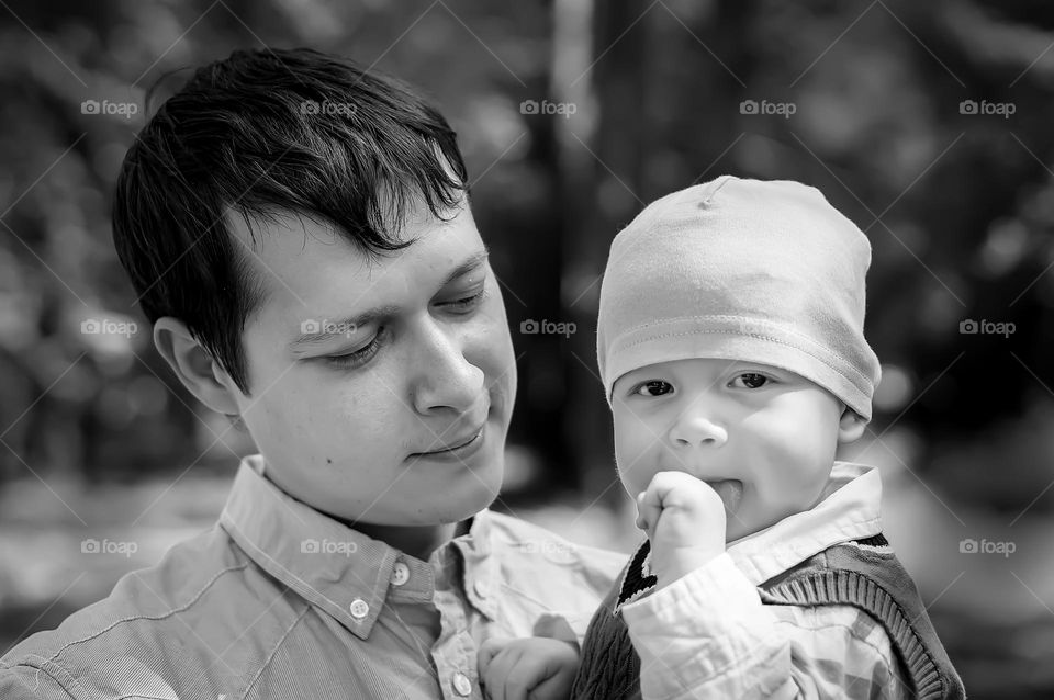 Father and son have fun together, taking care of children, happy parenthood, close-up lifestyle portrait