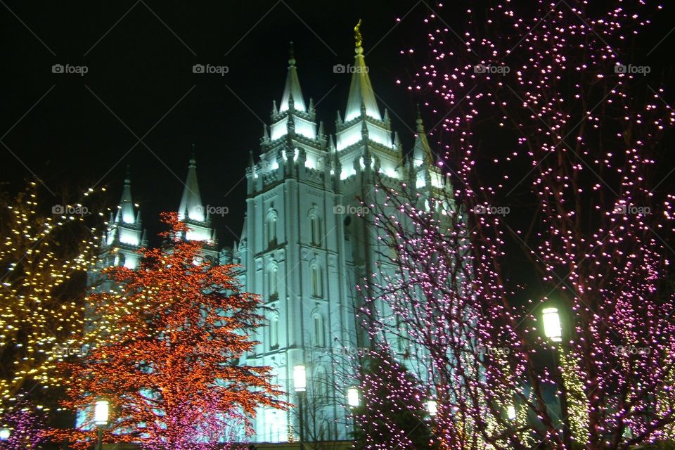 Salt Lake City, Utah LDS Temple at night during Christmas and filled with lights
