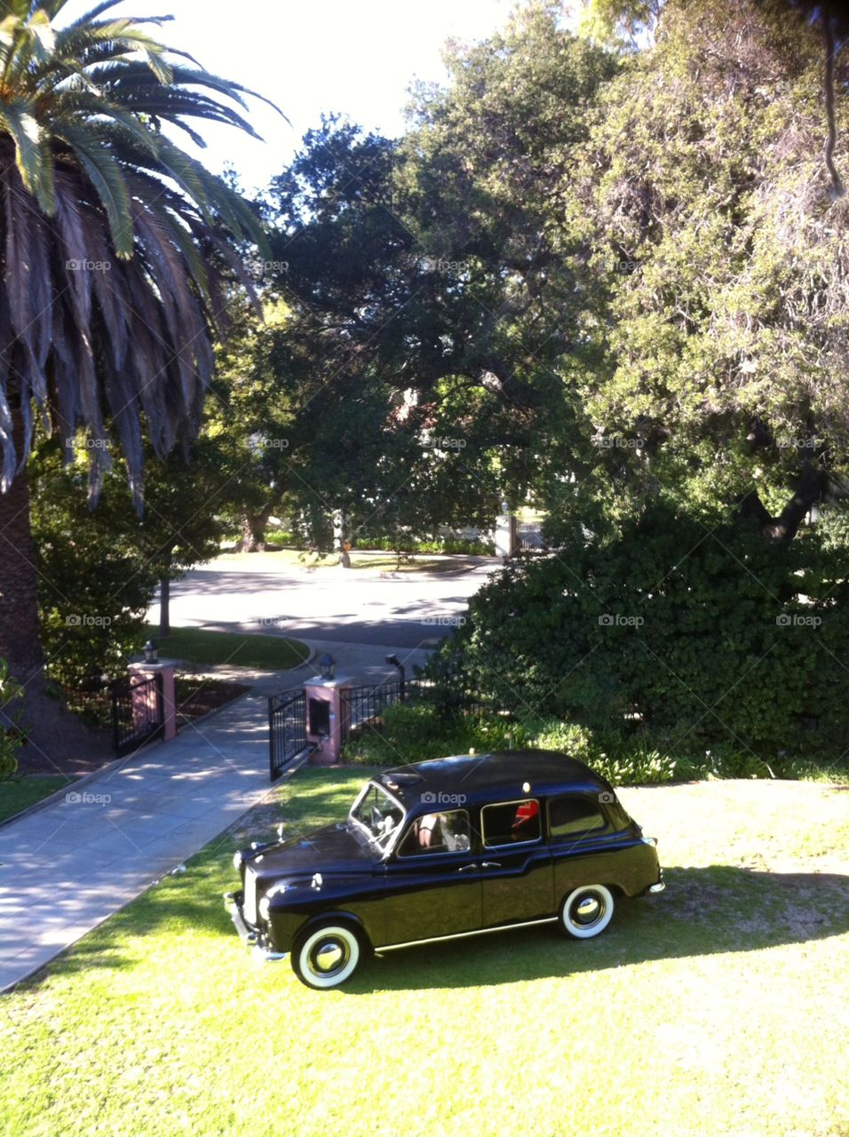 London taxi cab in front yard Usa 