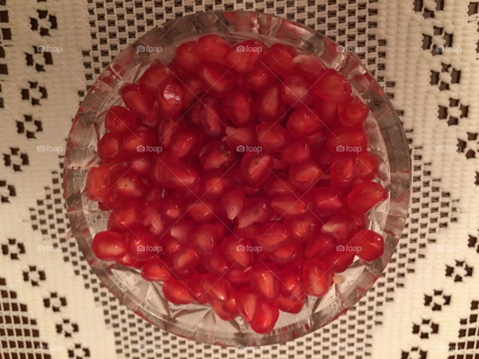 High angle view of pomegranate seeds in bowl