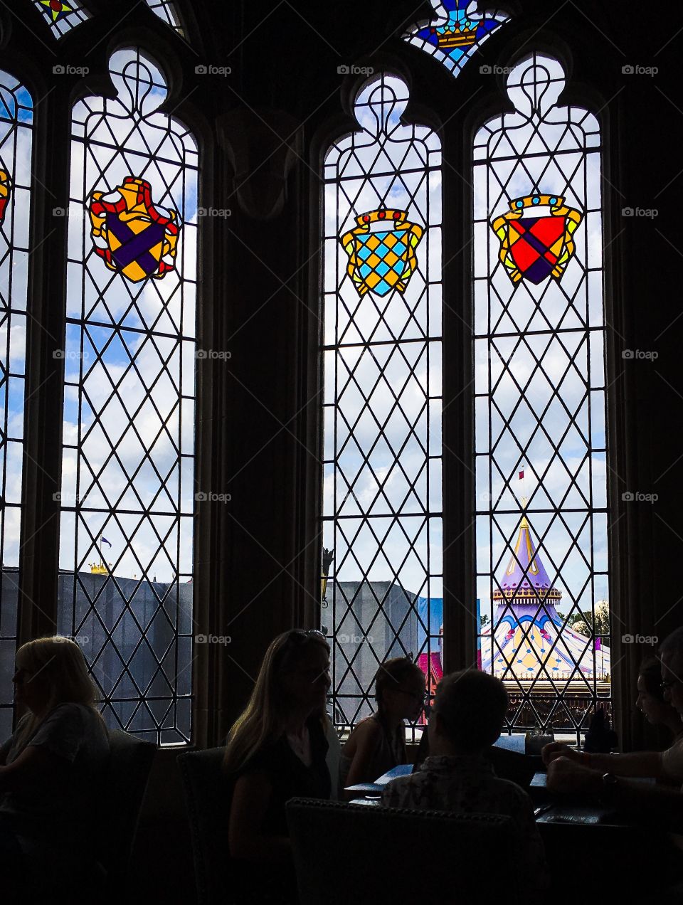 Inside looking out.  Beautiful stained glass windows in Cinderella Castle in the Magic Kingdom. 