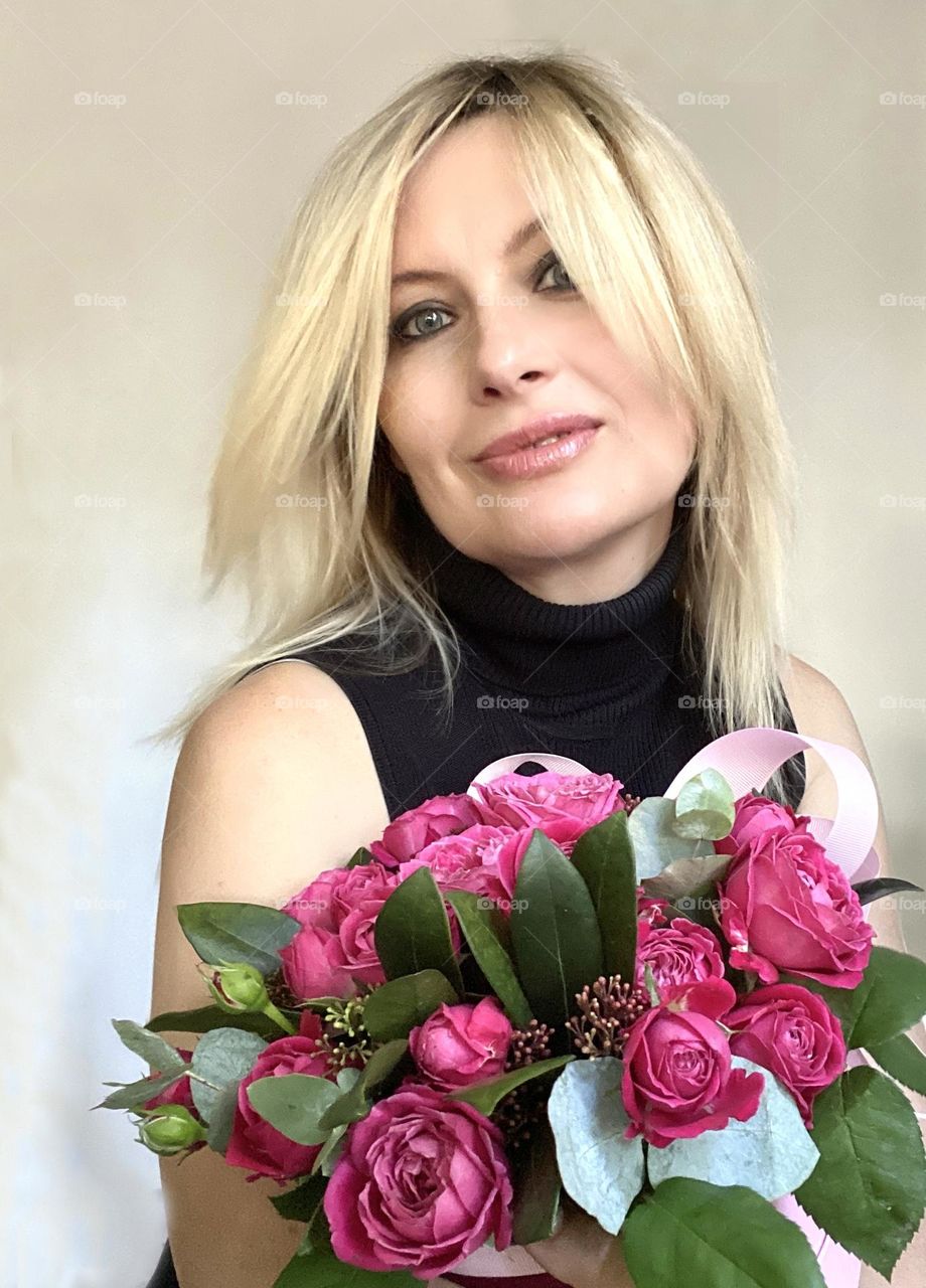 Woman with pink flowers